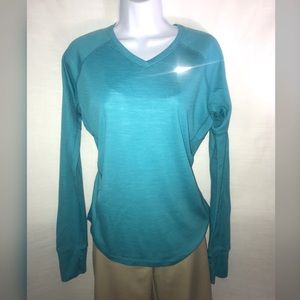Light blue long sleeve v-neck Nike top.